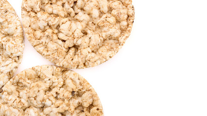 Puffed rice bread isolated on white background. Rice cakes. Round diet crispbreads on a white background. Round shaped cereal bread, healthy food without yeast. 