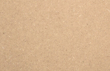 Structure and texture of raw mdf brown. Can be used as a background.