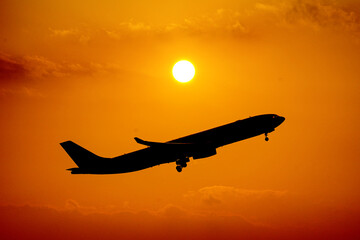 airplane at sunset