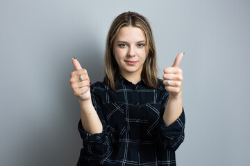 Beautiful teenager girl emotionally gesticulates