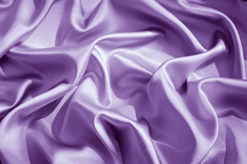 Fototapeten Light purple silk satin. Shiny smooth fabric. Wavy folds. Elegant lilac background with space for design. Romance, wedding, mother's day, valentine. © Наталья Босяк