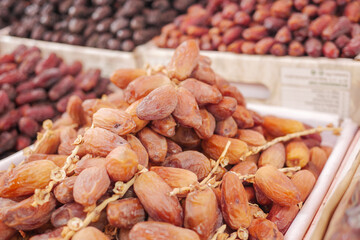  many date fruits display for sale at local market 