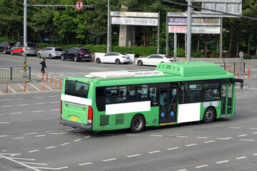 Bus on the road in Seoul, Bus billboards	