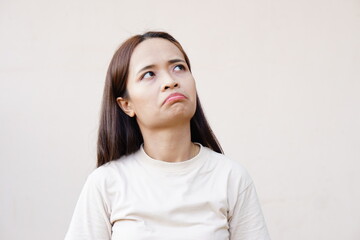 Fototapeta premium Asian woman making a bored face