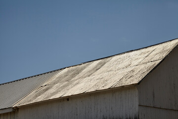 Fototapeta na wymiar Barn roof and clear blue sky, Amish Country, Lancaster County, PA, USA