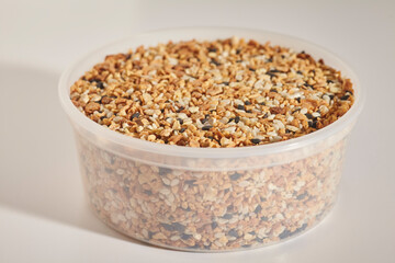 Everything seasoning in a plastic container