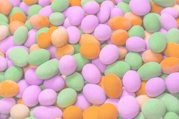 Group of colorful peanuts in glaze.