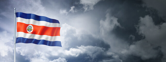 Costa Rican flag on a cloudy sky