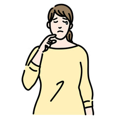 涙を流して辛そうにしている太った若い女性