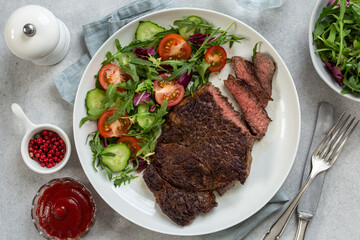 beef steak with fresh vegetable salad