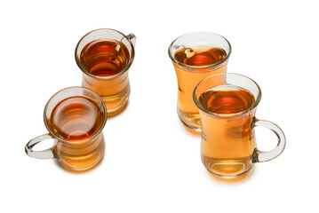 A turkish glass of tea isolated on white background.