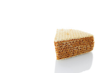 A sweet  piece of waffle cake isolated on white background.