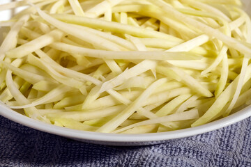 strips of fresh Green papaya for som tum