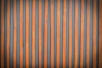 Wooden fence with small stakes