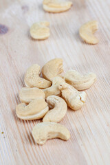 cashew nuts lying on a white board