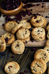 delicious dried cookies made of high-quality flour with dried red cranberries on the table