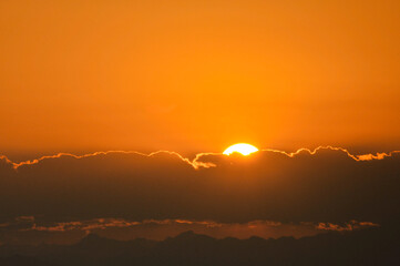 sunset over the clouds