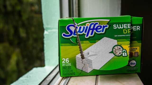 NORWALK, CT, USA - MAY 6, 2022:  Sweeper dry cloths from Swiffer in windows with  copy space