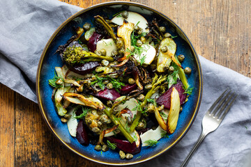 Warm salad with roast beetroor, broccoli, apple, fennel and crispy capers