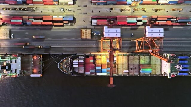 Shipping port, cargo container ship, crane, and car traffic transport in Asia city. Logistic industry or freight transportation business concept, drone aerial top view