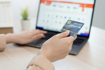 internet shopping e commerce concept, woman using credit card shopping on internet.