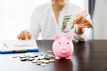 female calculating expenses and having ideas for saving money, saving money or savings concept.