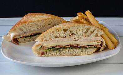 chicken club sandwich with french fries,