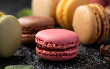 Homemade macarons chocolate, pistachio, lemon and raspberry french sandwich cookies