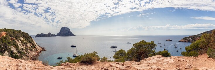 Hyper panoramic view of bay Cola d'Hort and two small rocky islands Es Vedra and Es Vedranell. Ibiza, Balearic Islands, Spain