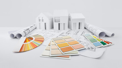 design and choice colors for house planning, plaster samples on blueprint with model house, supply...