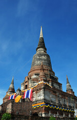 Fototapeta premium AYUTTHAYA, THAILAND-MAY 13: Wat Yai Chai Mongkol, is situated to the southeast of the city. The large chedi there can be seen from a great distance on May 13, 2014:Visakha Day in Ayutthaya,Thailand.