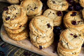 delicious dried cookies made of high-quality flour with dried red cranberries on the table
