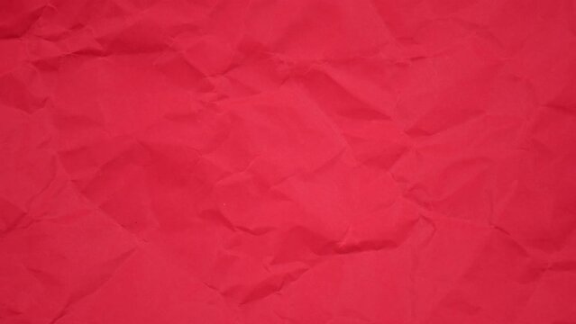Crumpled wrinkled sheet of paper background texture. Stop motion animation. Seamless looping.