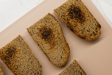 Fried slices of rye bread. Top view. Close-up