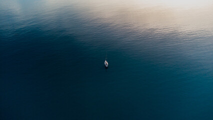 Ship in the sea. Drone aerial photography. Sea with crystal clear water.