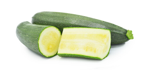 Whole and slices zucchini isolated on white background.