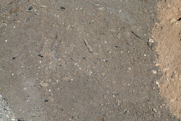 sand with stones on the construction site during the construction