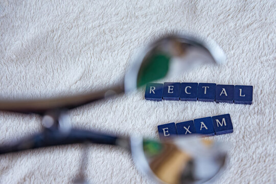 rectoscope with the words rectal exam on a white blanket