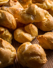 Profiteroles stuffed with cream, homemade bakery. close up