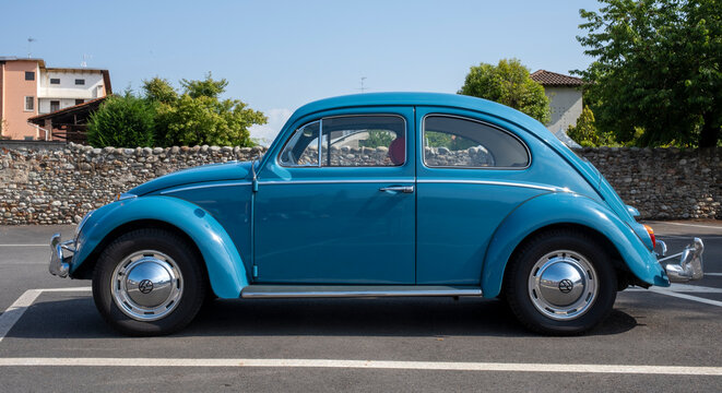 Vintage german motor car Volkswagen Beetle during a vintage cars rally. Gattinara / Italy, June 02, 2022.