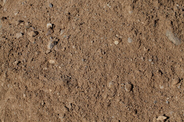 sand with stones on the construction site during the construction
