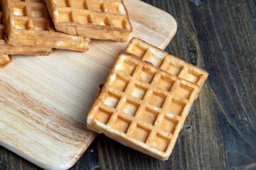 square sweet soft waffles on the table