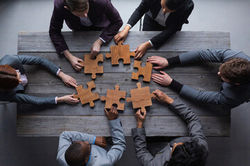 Business teamwork with puzzle - 508997142
