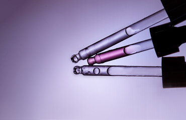Set of cosmetic pipette with essence and clear drop