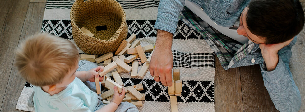 Long Banner For Design, Web Page. Father And Toddler Boy Child Little Son Playing With Wooden Blocks