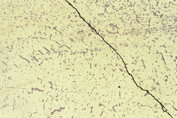 Old wall with a crack.Grunge background in dark color.