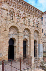 Obraz premium Lateral facade of the Cristo de la Luz Mosque, the most representative monument of the Mudejar architecture in Toledo, Castilla La Mancha, Spain. 