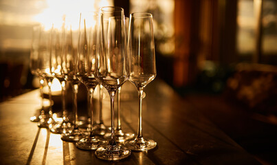 glasses with champagne, wine. glasses with alcohol on a bokeh background. holiday glasses for...