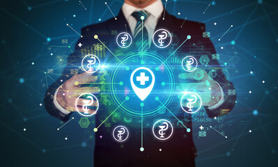 Hand holding healthcare icons concept