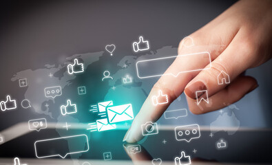 Close-up of a hand using tablet, social media concept